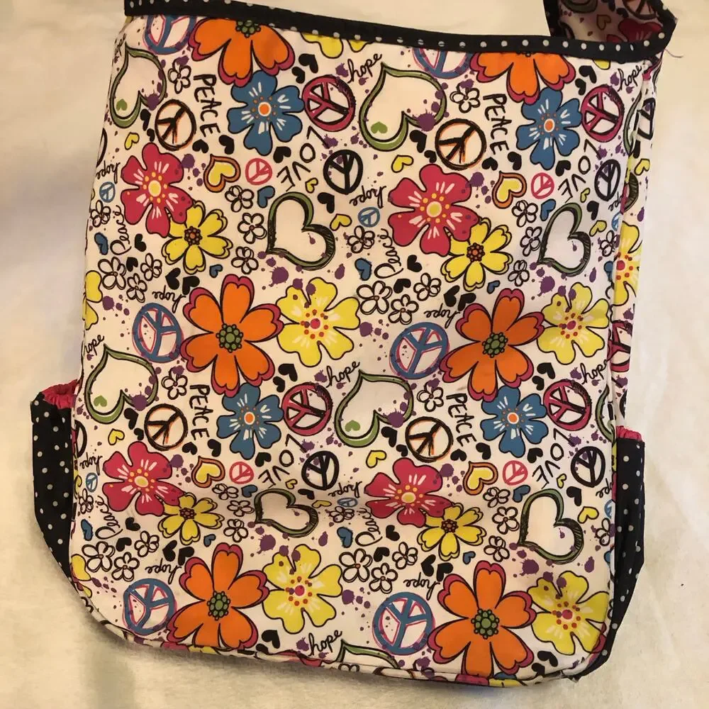 Justice flower Peace bag with adjustable strap.‎